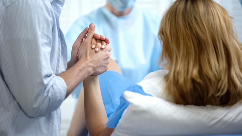 woman in hospital bed